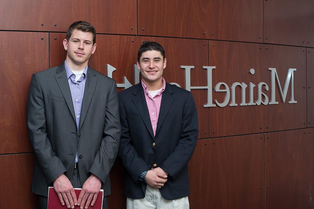 Two U N E students at their internship site, Maine Health